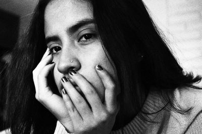 Close-up portrait of young woman