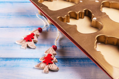 Gingerbread and biscuit baking mold is filled with dough. christmas and new year baking homemade