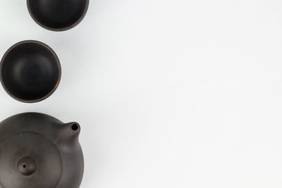 Directly above shot of white horse against gray background