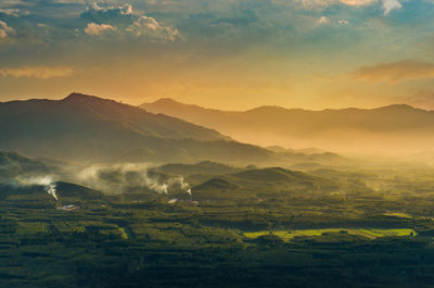 Scenic view of landscape against sky during sunset