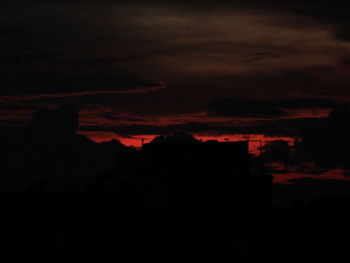 Silhouette of trees against sky during sunset