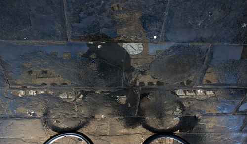 Close-up of rusty metal against wall