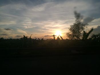 Scenic view of silhouette landscape against sky during sunset