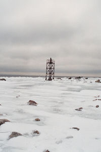 Scenic view of sea against sky during winter