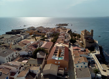 High angle view of buildings in sea