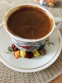 Close-up of coffee cup on table