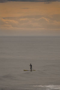 Man jumping in sea