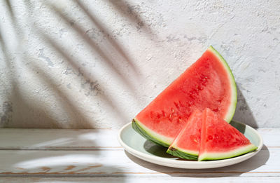 Close-up of fruits on table at home