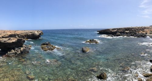 Scenic view of sea against clear sky