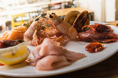 Seafood appetizer platter on the restaurant counter.