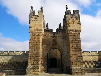 Low angle view of historic building against sky