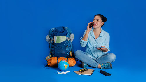 Young woman using mobile phone