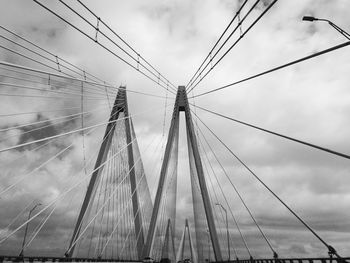 Fred hartman bridge against cloudy sky