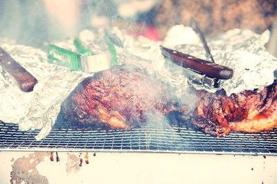 Close up of meat on barbecue grill