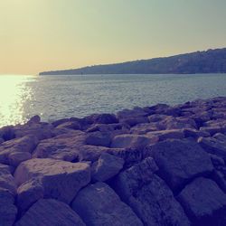 Scenic view of sea at sunset