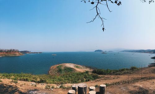 Scenic view of sea against clear blue sky