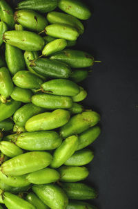 Green averrhoa bilimbi on black background