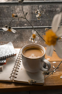 Close-up of coffee served on table