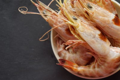 High angle view of shrimp in bowl on table