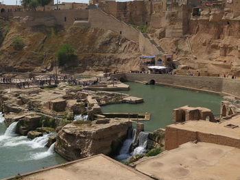 Aerial view of river amidst trees