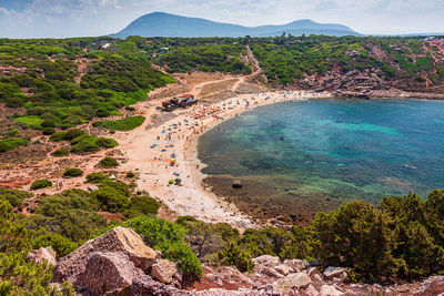 High angle view of rocks by sea