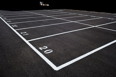 Empty parking lot at night