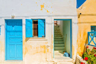 Typical blue door and window in emporio on the island of santorini