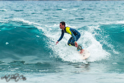 Man surfing on sea