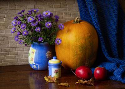 Close-up of purple flowers in vase