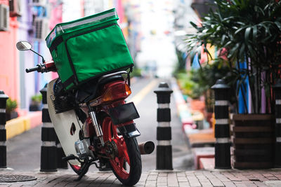 Delivery service motorcycle park on the pavement