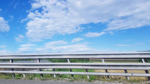 Bridge over road against sky