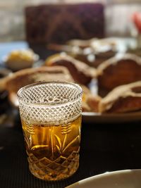 Close-up of beer glass on table