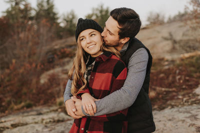 Young couple standing on land