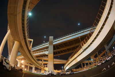 Low angle view of modern buildings in city at night