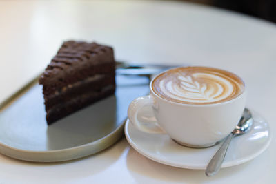 Coffee cup on table