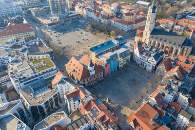 High angle view of street amidst buildings in town