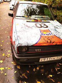 Close-up of car on road