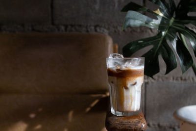 Close-up of beer glass on table