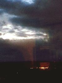 Dramatic sky over illuminated city