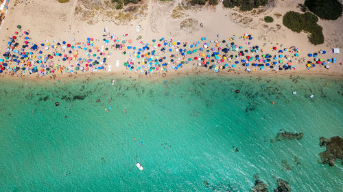 High angle view of multi colored umbrellas on beach