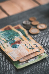 High angle view of currency on table