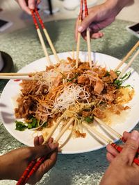 Midsection of woman holding food