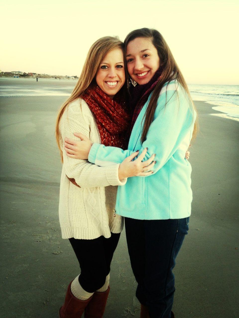 lifestyles, leisure activity, person, casual clothing, bonding, standing, togetherness, young adult, looking at camera, beach, front view, portrait, smiling, three quarter length, happiness, love, young women