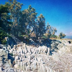 Rock formations against blue sky