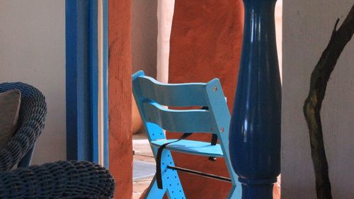 Blue chair at doorway