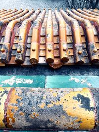 High angle view of old rusty metal in row