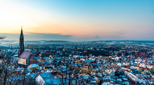 High angle view of townscape against sky during sunset