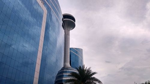 Low angle view of modern building against sky