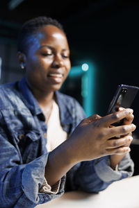 Young man using mobile phone