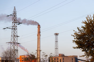 Raw coal drying in a factory. smoke pollutes the environment.